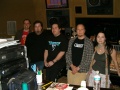Recording engineer Wesley Seidman, Terry Balsamo, producer Dave Fortman and Amy Lee in the studio's control room[note 1]